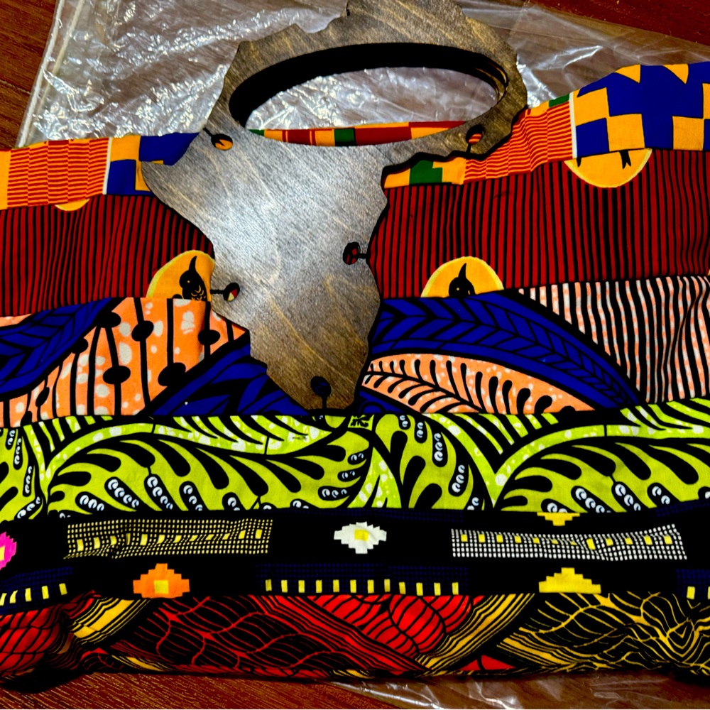 African Handmade wooden handles and bag .. one of a kind!